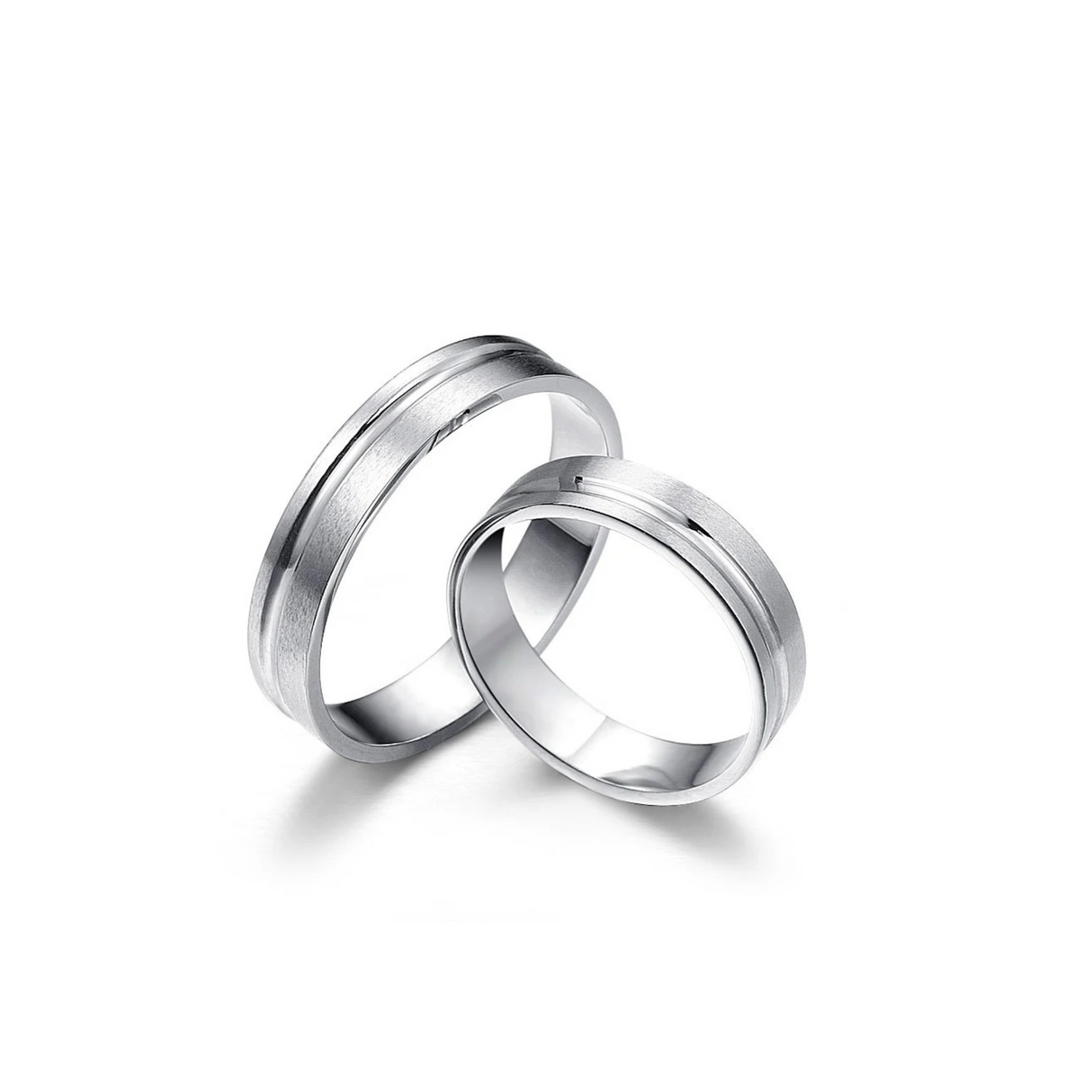 Obrączki z białego zlota z matową powierzchnią i delikatnym frezem