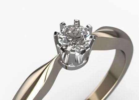 Diamentowa korona - pierścionek ze złota z brylantem 0,15 ct.