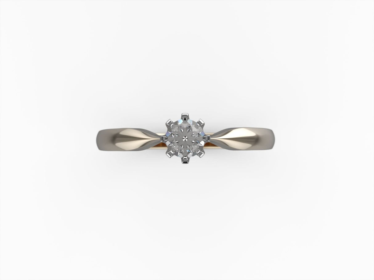 Diamentowa korona - pierścionek ze złota z brylantem 0,15 ct.