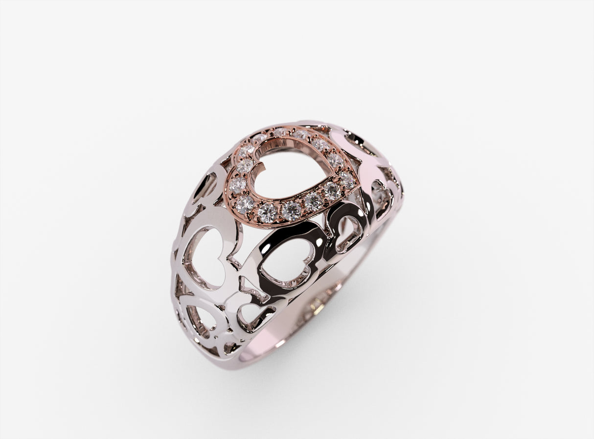 Złoty pierścionek z motywami serc i diamentami 0,12 ctw