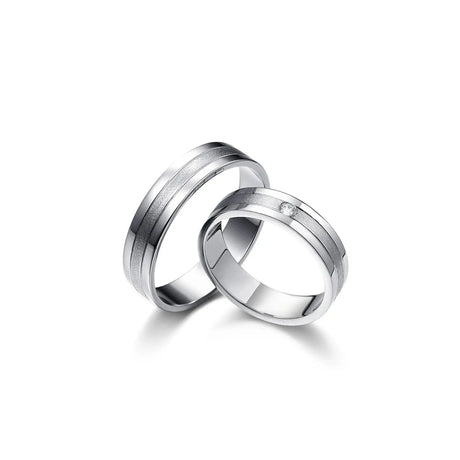 Obrączki z białego złota ozdobione diamentem