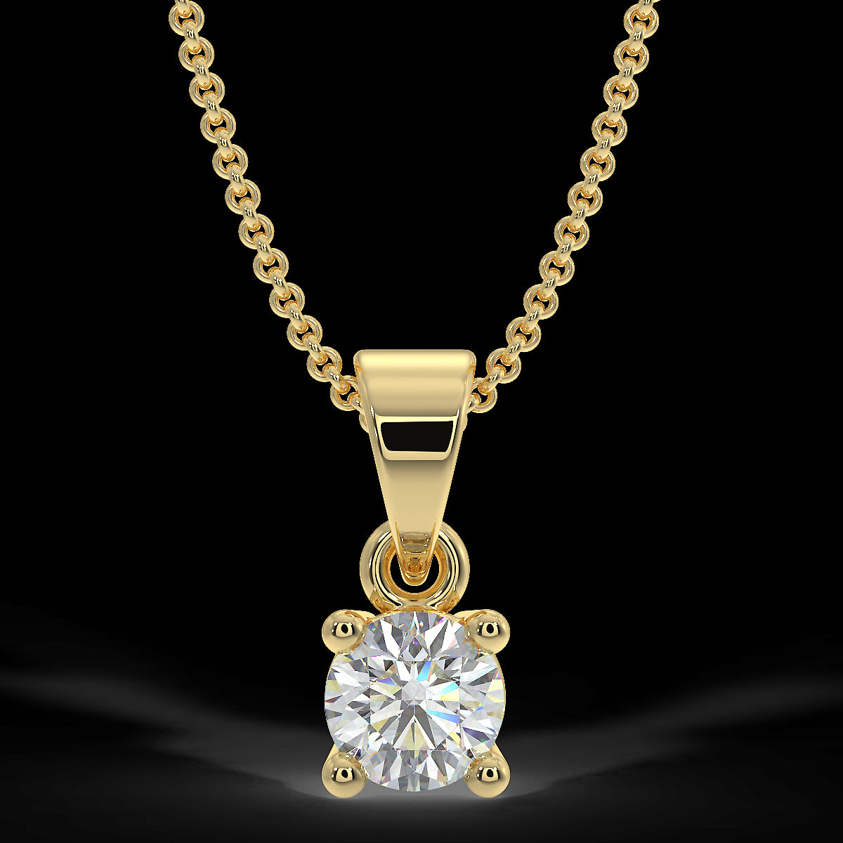 Zawieszka z żółtego złota z diamentami o masie 0,15 ct