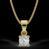 Zawieszka z żółtego złota z diamentami o masie 0,15 ct